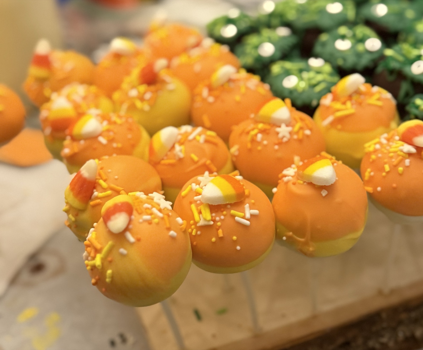 Candy-corn cake pops with sprinkles